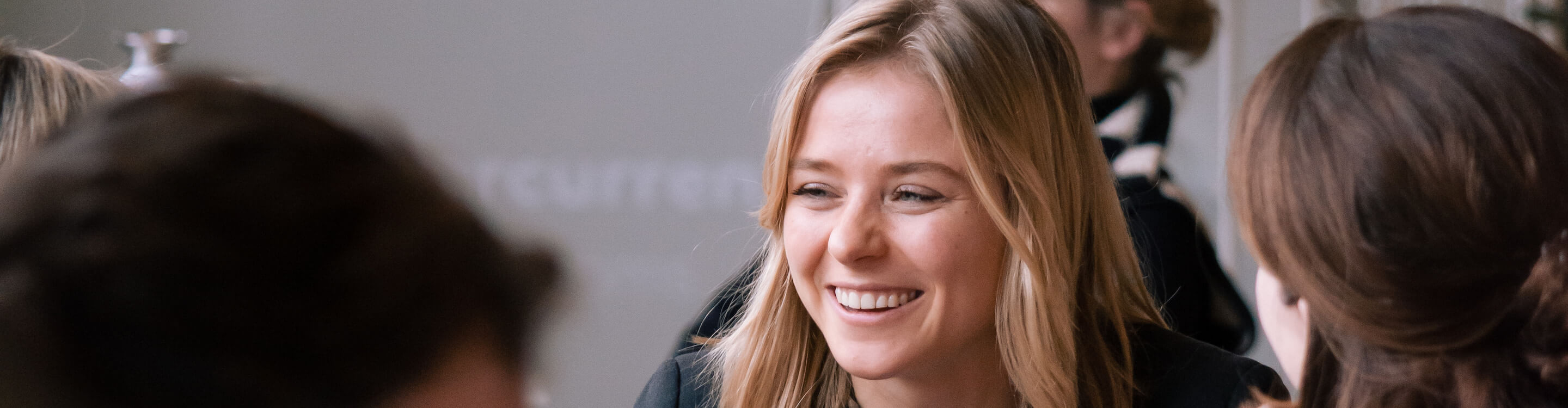 Lachende gezichten van Great Place To Work medewerkers